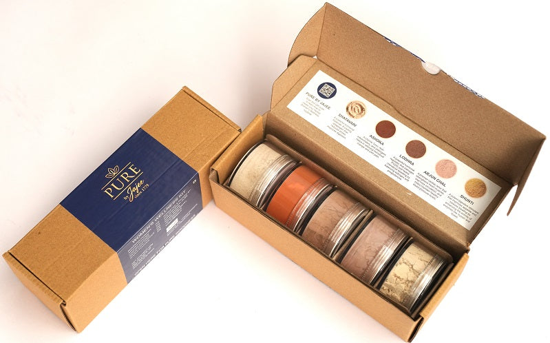 Pure by Jajee Women's Wellness Kit featuring 5 jars of raw Ayurvedic powders: Shatavari, Ashoka, Lodhra, Arjun Chal, and Shunti for natural hormonal balance and cycle regularity.