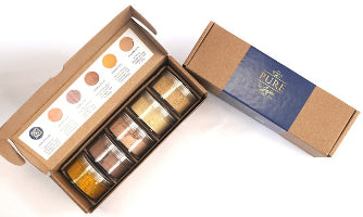 Pure by Jajee Body Care Kit featuring 5 individual jars of Ayurvedic powders: Multani Mitti, Kasturi Haldi, Rose, Orange Peel, and Sandalwood